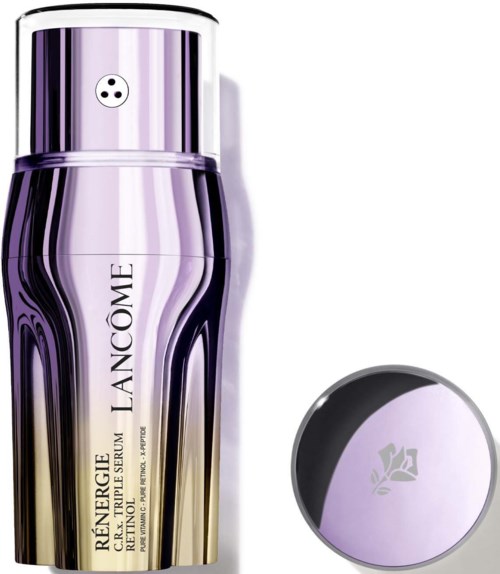 Eine lila und goldene Flasche mit Hautserum, silberner Deckel, beschriftet Lancôme Rénergie. Eine kleine runde Dose in der Nähe.