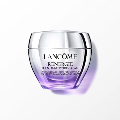 Een paarse en zilveren pot met Lancôme Rénergie anti-aging crème met zilveren deksel.