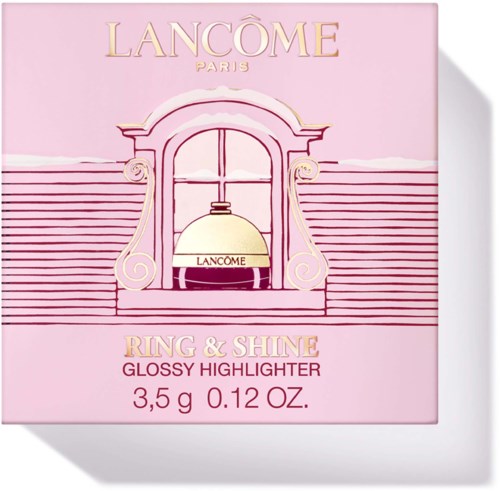 Lancôme Paris Ring & Shine glanshighlight i en rosa boks med dekorasjon og produktdetaljer.