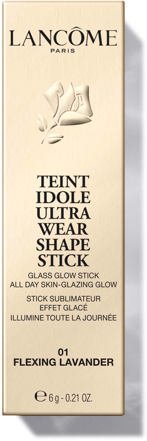 Een lange, crèmekleurige doos voor Lancôme glow stick met lavendelgeur. Het heeft zwarte tekst en een klein logo.