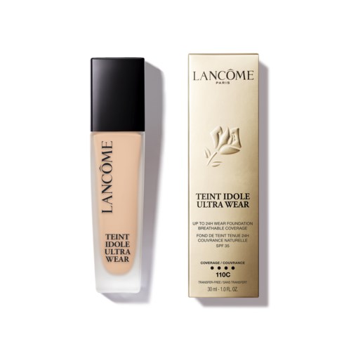 Lancôme foundation and its box shown, with beige liquid inside the bottle.