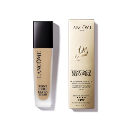 A bottle of Lancôme Teint Idole Ultra Wear foundation with its box, both in beige and black colors.