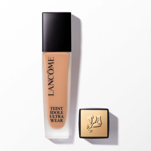 A bottle of Lanc f4me foundation and a compact with a hand and heart symbol.
