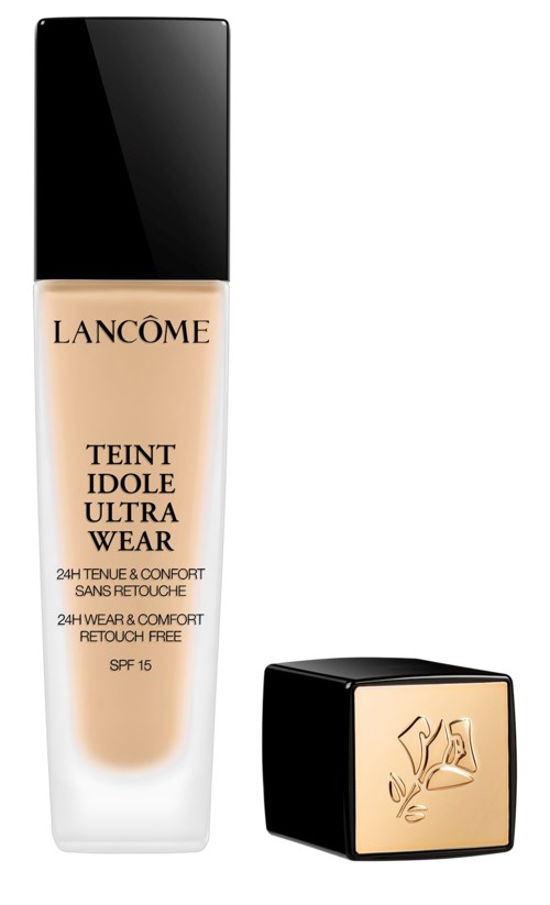 En flaska Lancôme foundation med svart lock och ett guld logolock.