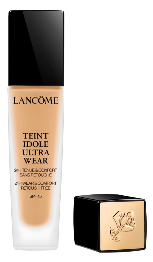 Lancôme-foundationsflaska med svart lock och guldig botten. Visar SPF 15 och 24-timmars hållbarhet. Text i svart och guld.