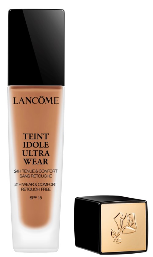 En flaska av Lancôme-foundation och en liten fyrkantig sminkförpackning med en logga.