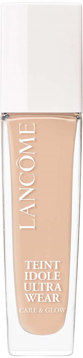 A bottle of Lancôme Teint Idole Ultra Wear foundation, light beige color, with a white cap and clear body.