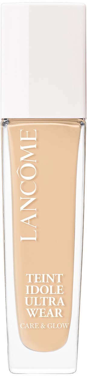 A beige liquid foundation in a clear bottle with a white cap, labeled 'Lancôme Teint Idole Ultra Wear'.