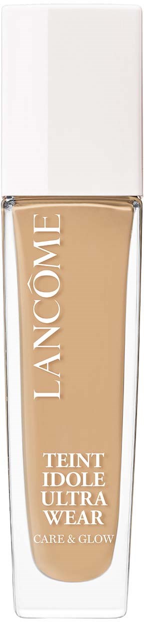A bottle of Lancôme Teint Idole Ultra Wear foundation with a white cap and beige liquid inside.