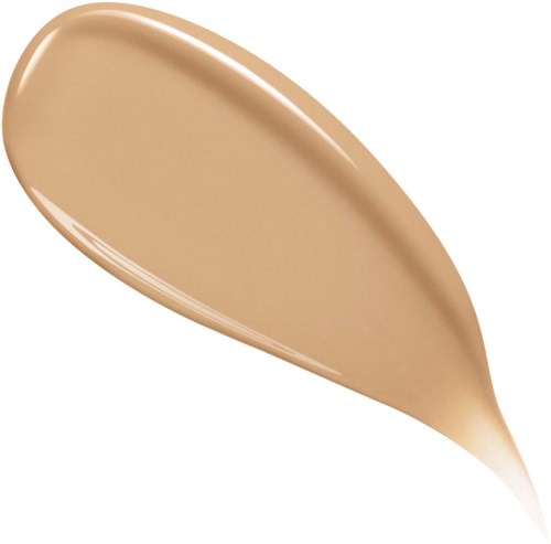 Een beige, druppelvormige smurrie met een glanzend, glad oppervlak en reflecties.