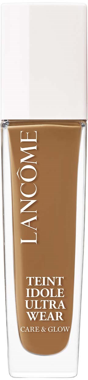 A bottle of Lanc f4me foundation with white cap, tan liquid inside, label reads 'Teint Idole Ultra Wear'.