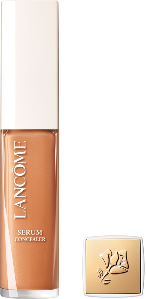 Lancôme serum concealer bottle next to a small compact with a rose design.