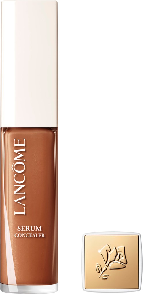 A Lancôme serum concealer bottle with a beige cap and small square container.