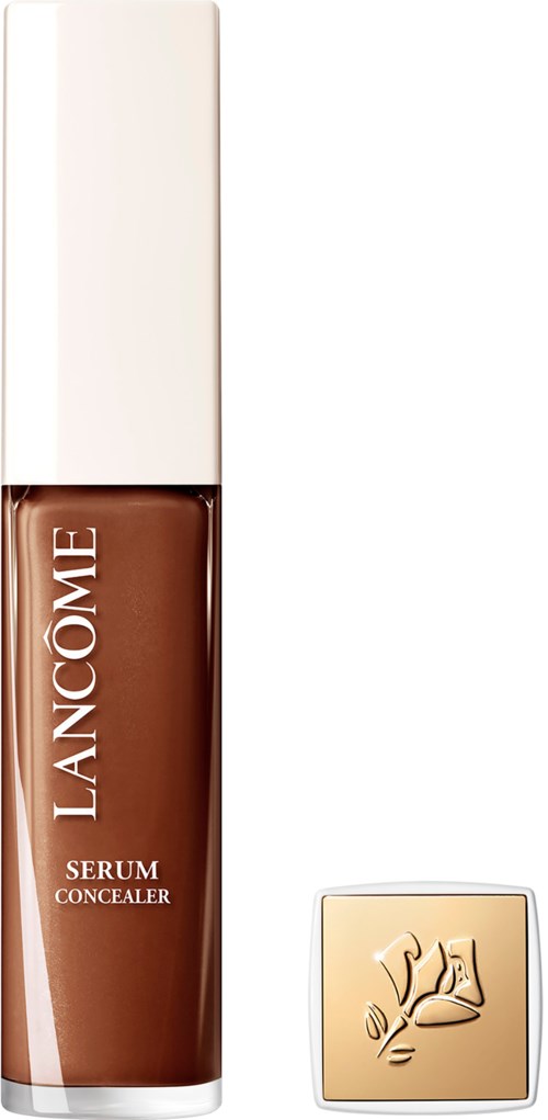 A makeup product with a bottle of serum concealer and a separate square cap featuring a rose design.
