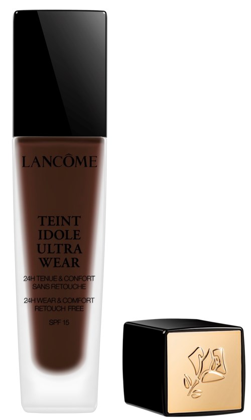 Lancôme flytande foundationflaska och ett litet kvadratiskt kompakt med en blomsterdesign.