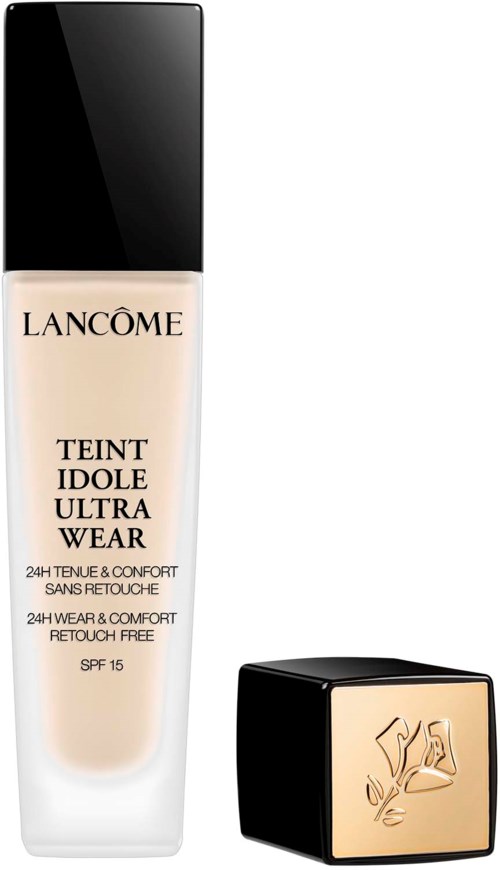 Lancôme foundation och en liten svart och guld behållare, troligen för smink- eller hudvårdsprodukter.