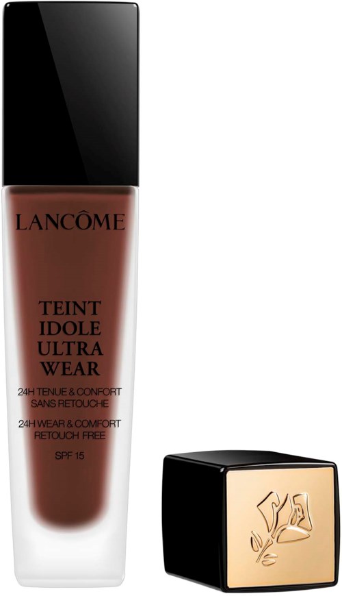 En flaska av Lancôme-foundation och en kvadratisk make-up-ask med en guldig logga.