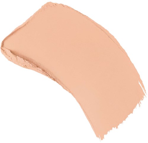 A beige makeup concealer swatch in a curved shape against a white background.