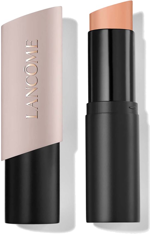 A lipstick with a beige cap and black body, standing upright. The brand name Lancôme is visible on the cap.