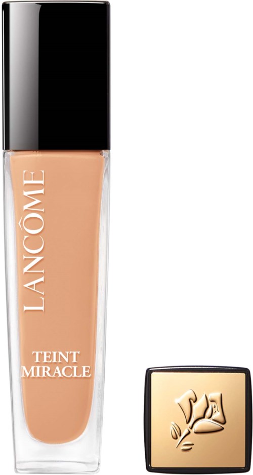Een fles Lancôme Teint Miracle foundation met een zwart deksel en een vierkant gouden deksel met rozenlogo.