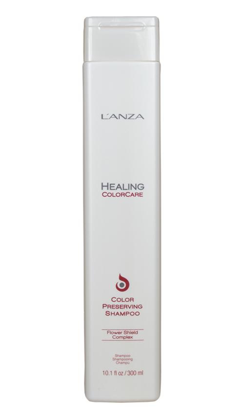 Een lange witte fles L'ANZA Healing Colorcare shampoo met rode en zwarte tekst en een gebogen rood logo.