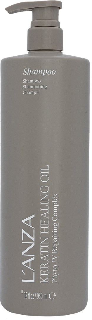 Graue Shampoo-Flasche mit Pumpköpfen, beschriftet 'L'ANZA' und 'Healing Oil.'
