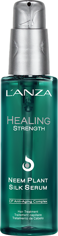 En teal sprayflaska med silverlock, märkt 'L'ANZA Healing Strength Neem Plant Silk Serum.'