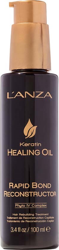 Zwarte fles met gouden pomp, gelabeld 'LANZA Keratin Healing Oil' voor haarbehandeling.