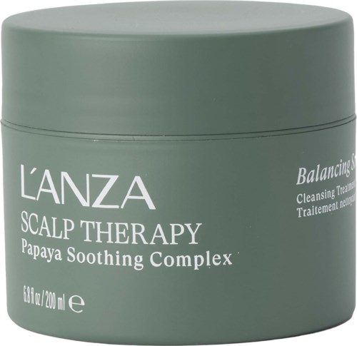 A round, green jar of L'ANZA scalp therapy cream with white text indicating it's for soothing and balancing the scalp.