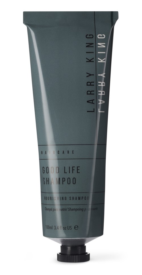 Eine dunkelgraue Tube mit der Aufschrift LARRY KING GOOD LIFE SHAMPOO und schwarzem Deckel, steht aufrecht.