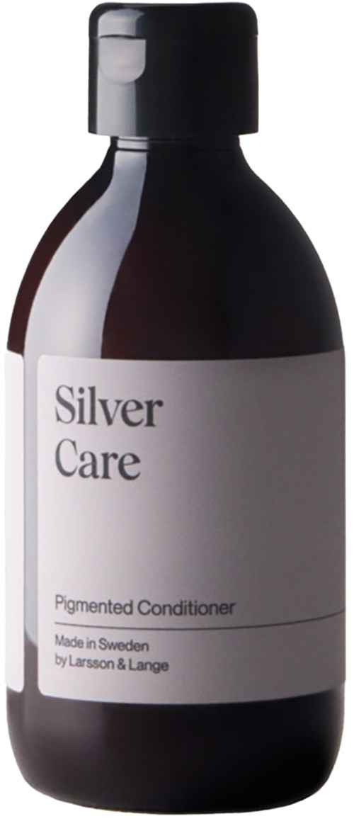 Een donkere fles met label 'Silver Care', die aangeeft dat het een getinte conditioner uit Zweden is.