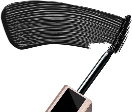 Black mascara with a wand creating a smear of makeup.