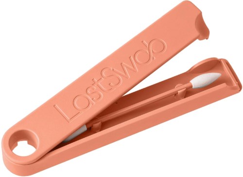 Ett persikfärgat fodral med en vit rengöringsanordning inuti, märkt "Lostwacp."