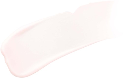 Ett ljust rosa, slätt skönhetsprodukt eller kräm som sprids på en vit yta.