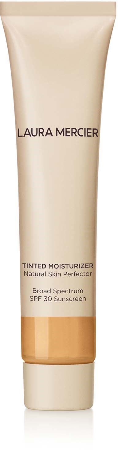 En beige tub av Laura Mercier tonad fuktighetskräm med SPF 30, märkt som en naturlig hudförbättrare.