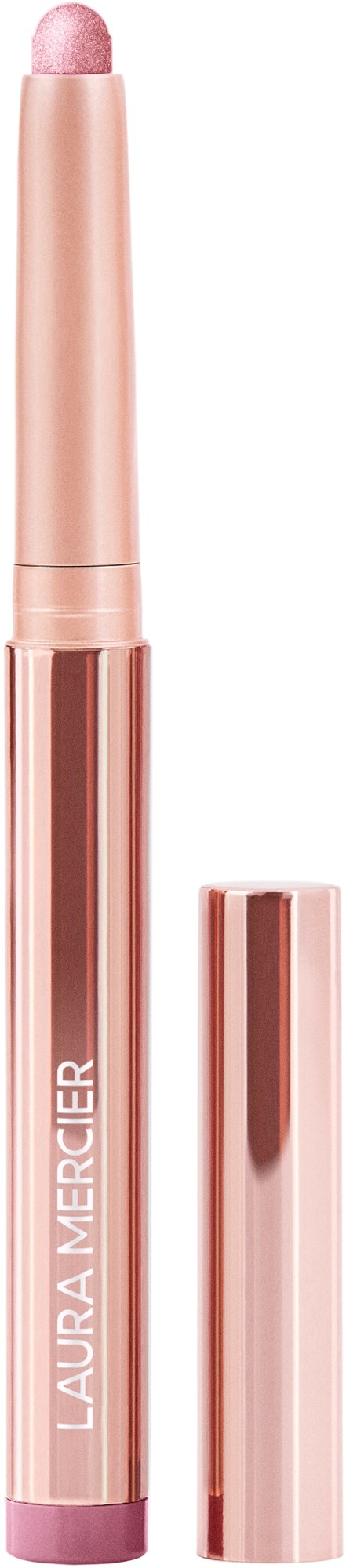 En rosafärgad penna med rund spets märkt "LAURA MERCIER."