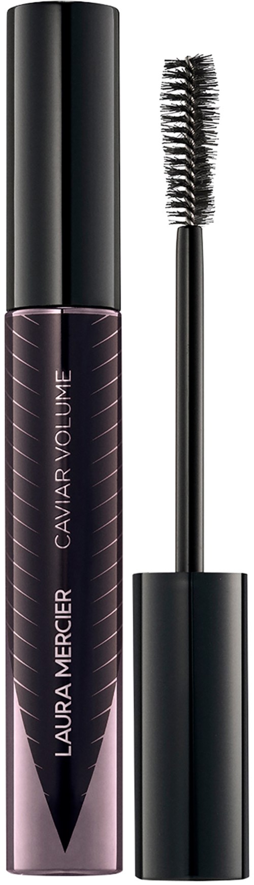 En mascaratub som står bredvid sin borste, märkt Laura Mercier Caviar Volume.
