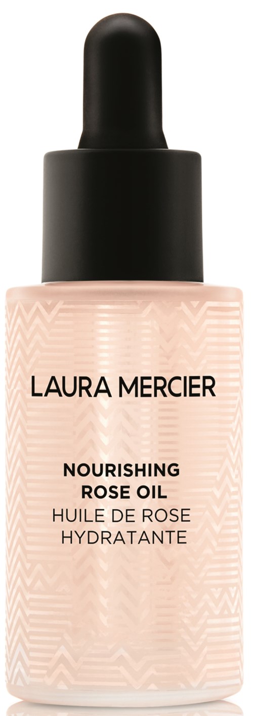 En flaska med Laura Mercier näringsrik rosolja med svart dropphatt och rosa etikett.