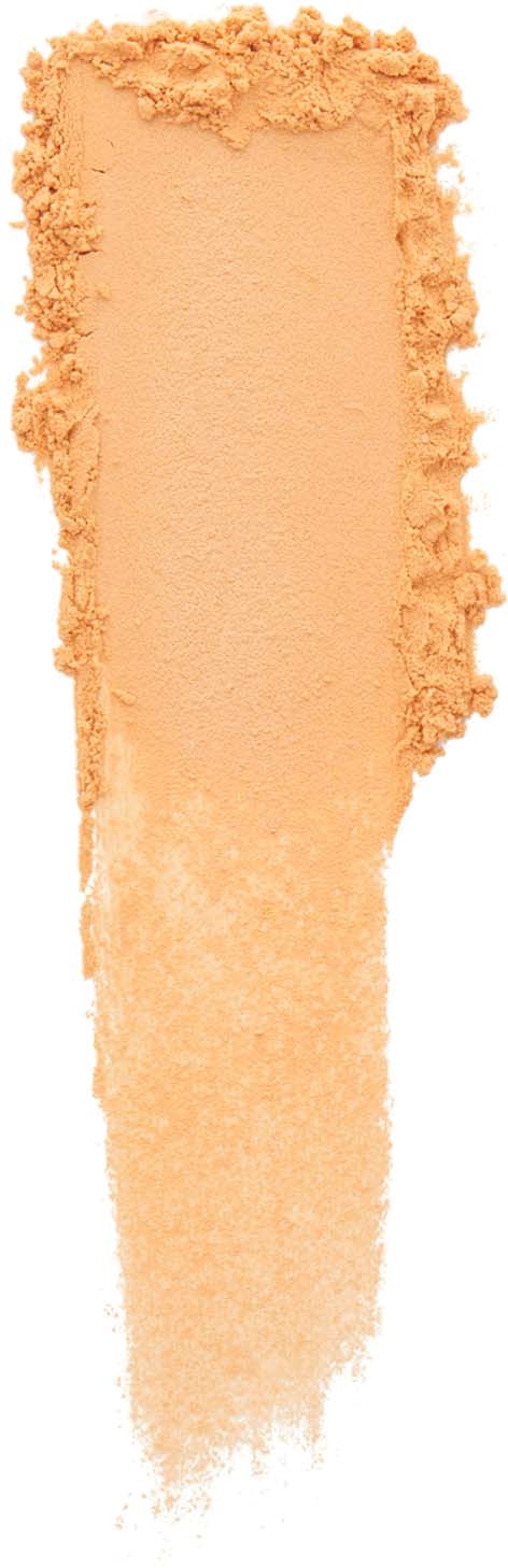 En lång, vertikal rand av beige pulver, med en ojämn kant upptill och en avmattande svans nedanför.