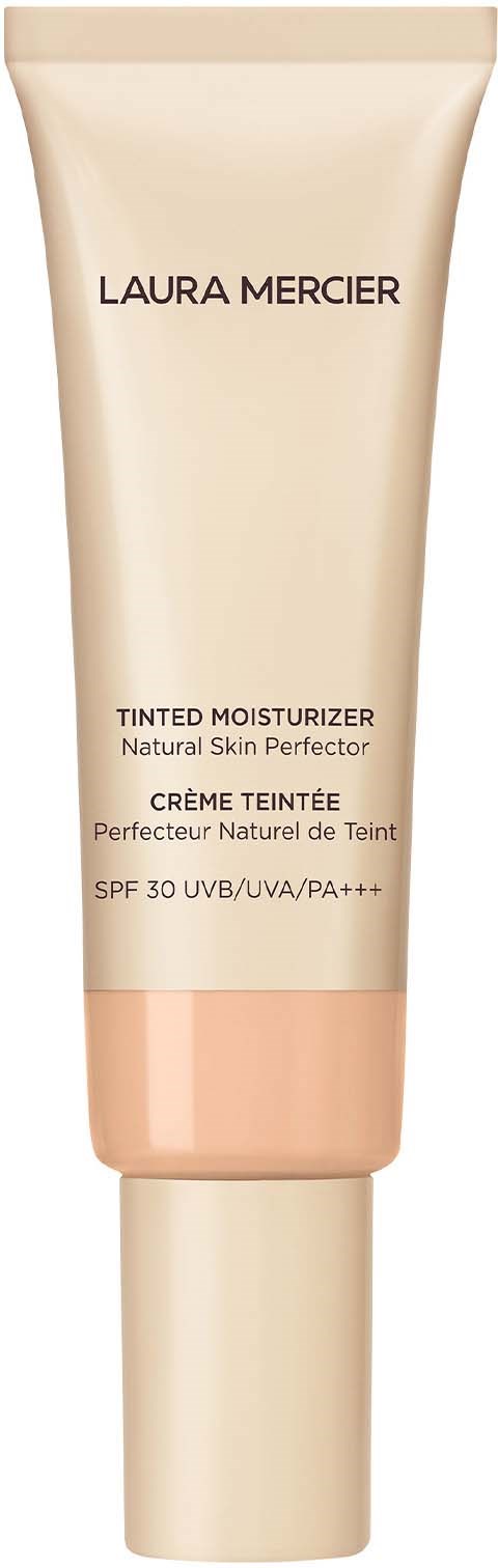 En tub med Laura Mercier tintad moisturizer med solskydd, för naturlig hud, i beige färg.