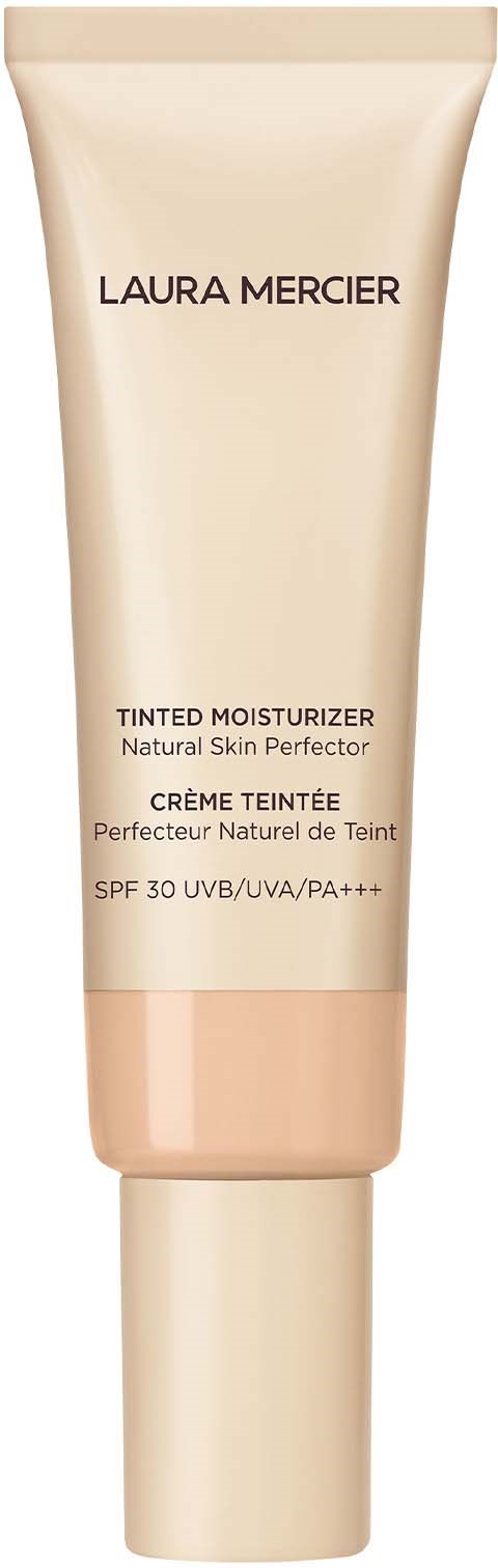 En beige tub märkt Laura Mercier färgtonad fuktighetskräm med SPF 30. Den har ett lock och enkel text på.