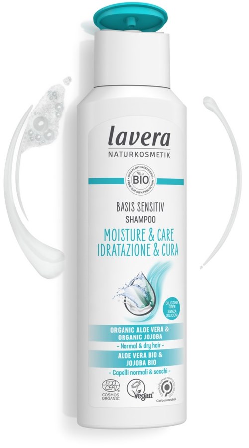 A white shampoo bottle with blue and gray labels, featuring an aloe vera image and text about sensitive skin and organic ingredients.