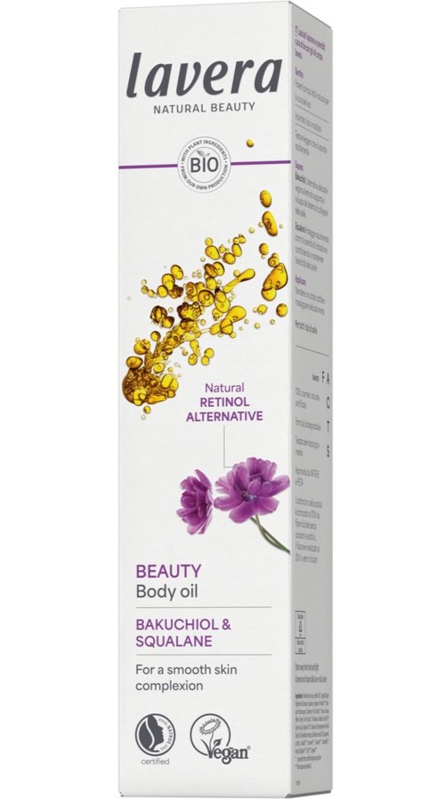 Białe opakowanie Lavera Beauty olej do ciała z fiołkowymi kwiatami, zawiera retinol, Bakuchiol i Squalane, logo wegańskie i organiczne.