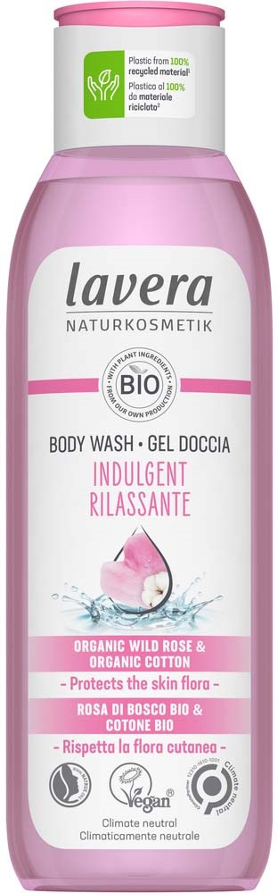 Pink and white bottle of Lavera body wash with organic rose and cotton, labeled for gentle, relaxing cleansing.