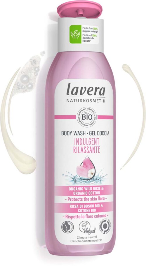 Pink body wash bottle with green and white labels, featuring organic rose and cotton, designed for gentle skin care.