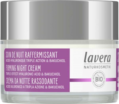 A jar of Lavera firming night cream with purple and white label, containing skincare for night use.