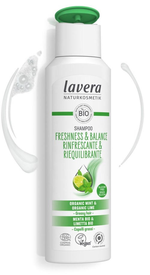 A white shampoo bottle with a green flip top, featuring lime and mint images, labeled for freshness and balance, organic and vegan.