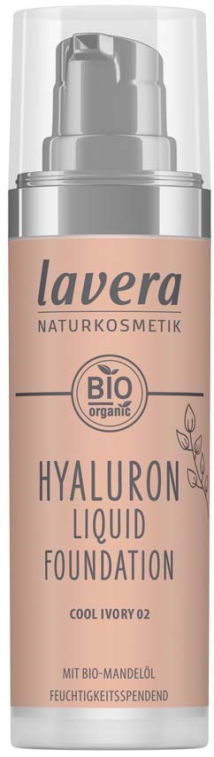 A skincare bottle labeled "Lavera Hyaluron Liquid Foundation" with a pump, pinkish-tan color, and organic certification.