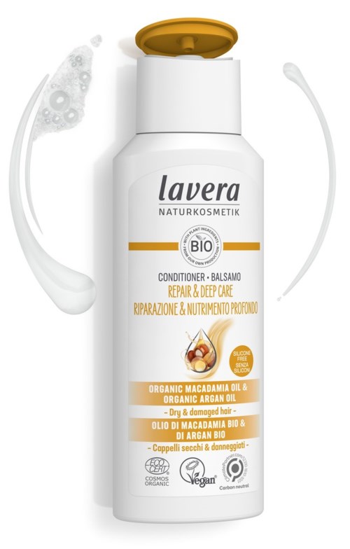 A white bottle with a gold lid labeled 'Lavera Bio'. It contains organic macadamia and argan oils for hair repair.