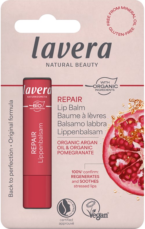 Läppbalsam i rosa tube, förpackningen visar granatäpple och nämner reparations- och ekologiska ingredienser.